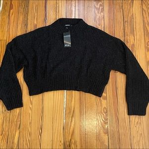 Black mockneck sweater